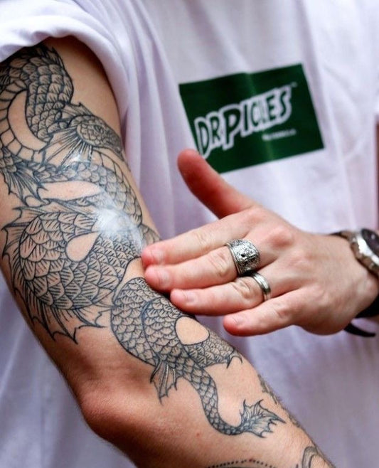 Your Tattoo Is Not Healed When the Peeling Stops (Here's What's Actually Happening)